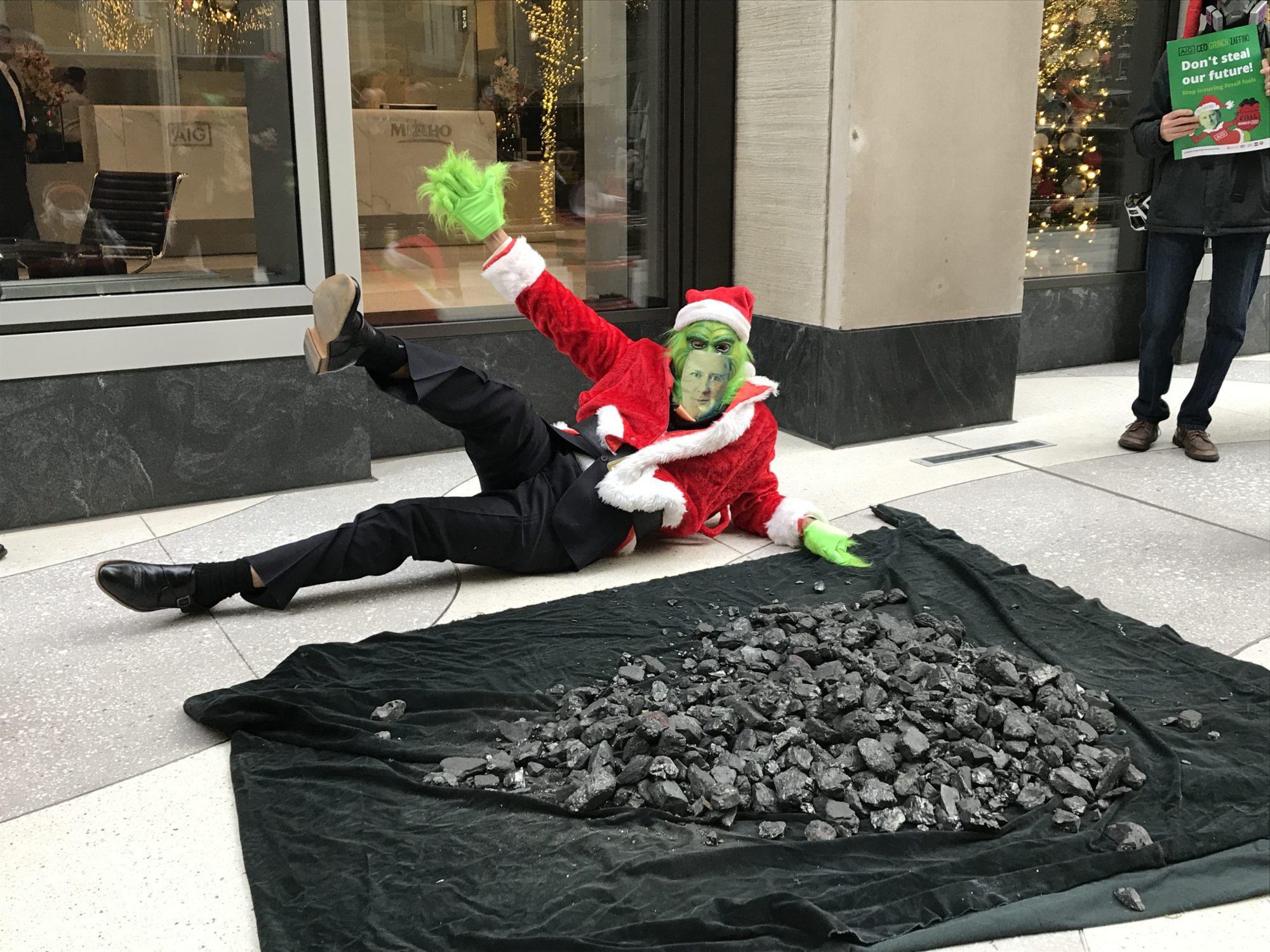 The Grinch presents a pile of coal