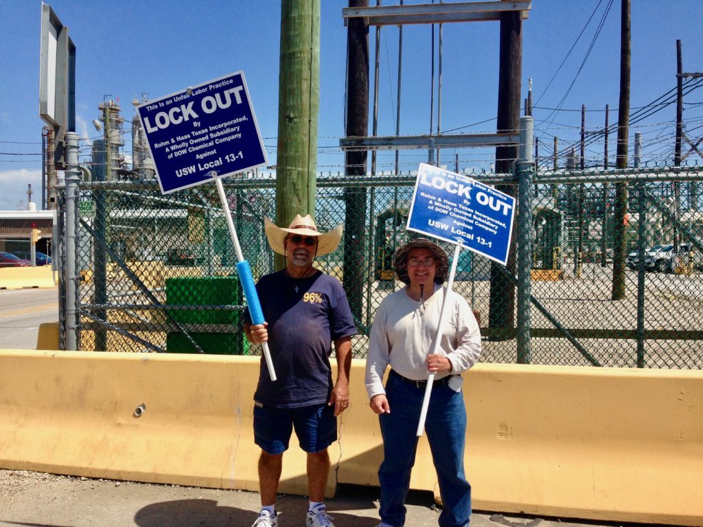 United Steel Workers union members protest the worker lockout