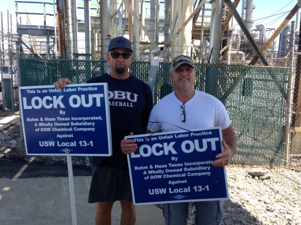 United Steel Workers union members protest the worker lockout 